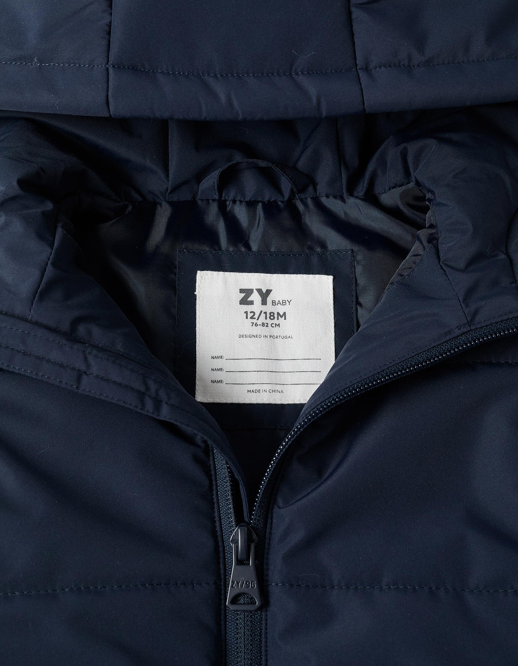 Hooded puffer vest with front zip for babies, navy blue