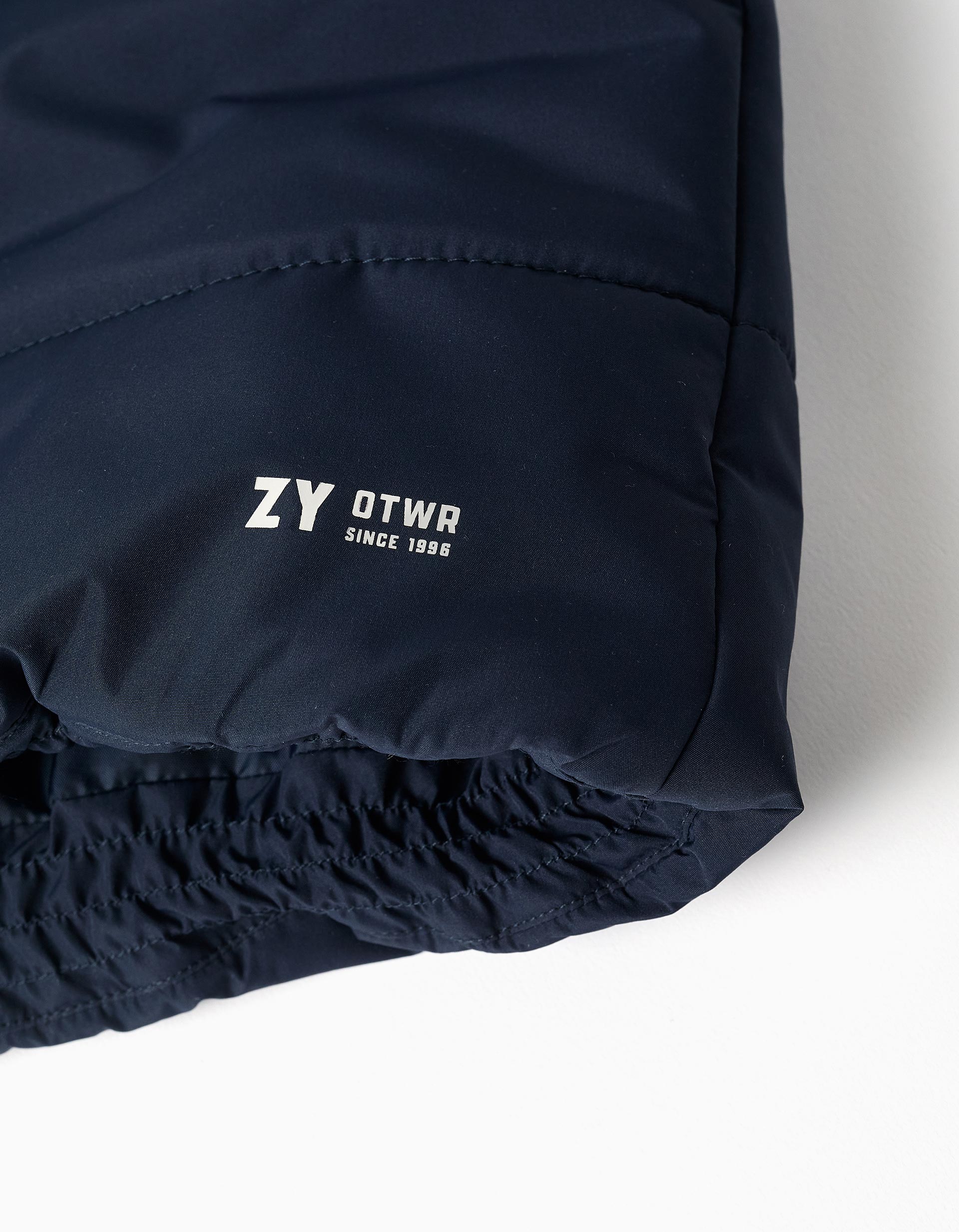 Hooded puffer vest with front zip for babies, navy blue