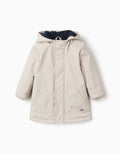 Hooded padded parka with front pockets for baby boys, light beige