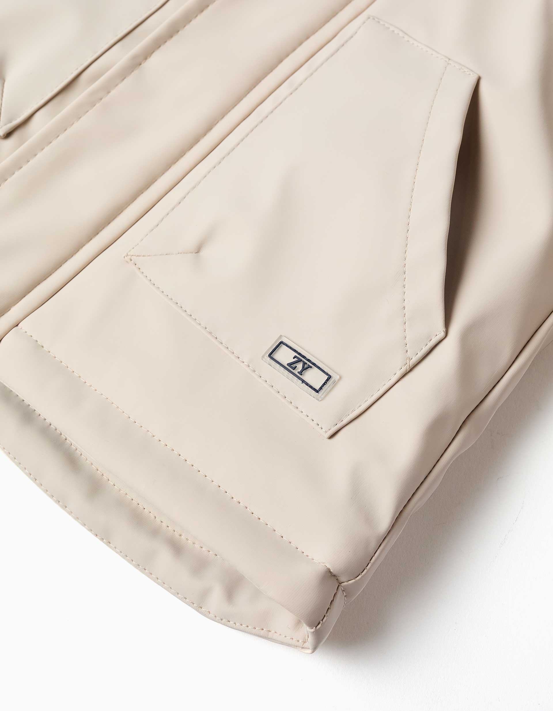 Hooded padded parka with front pockets for baby boys, light beige