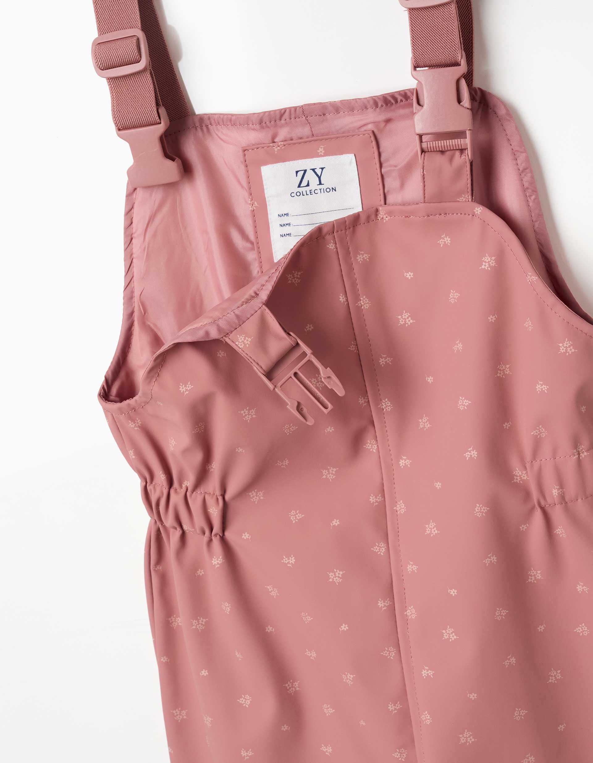 Rubber rain dungarees with floral print for girls, pink