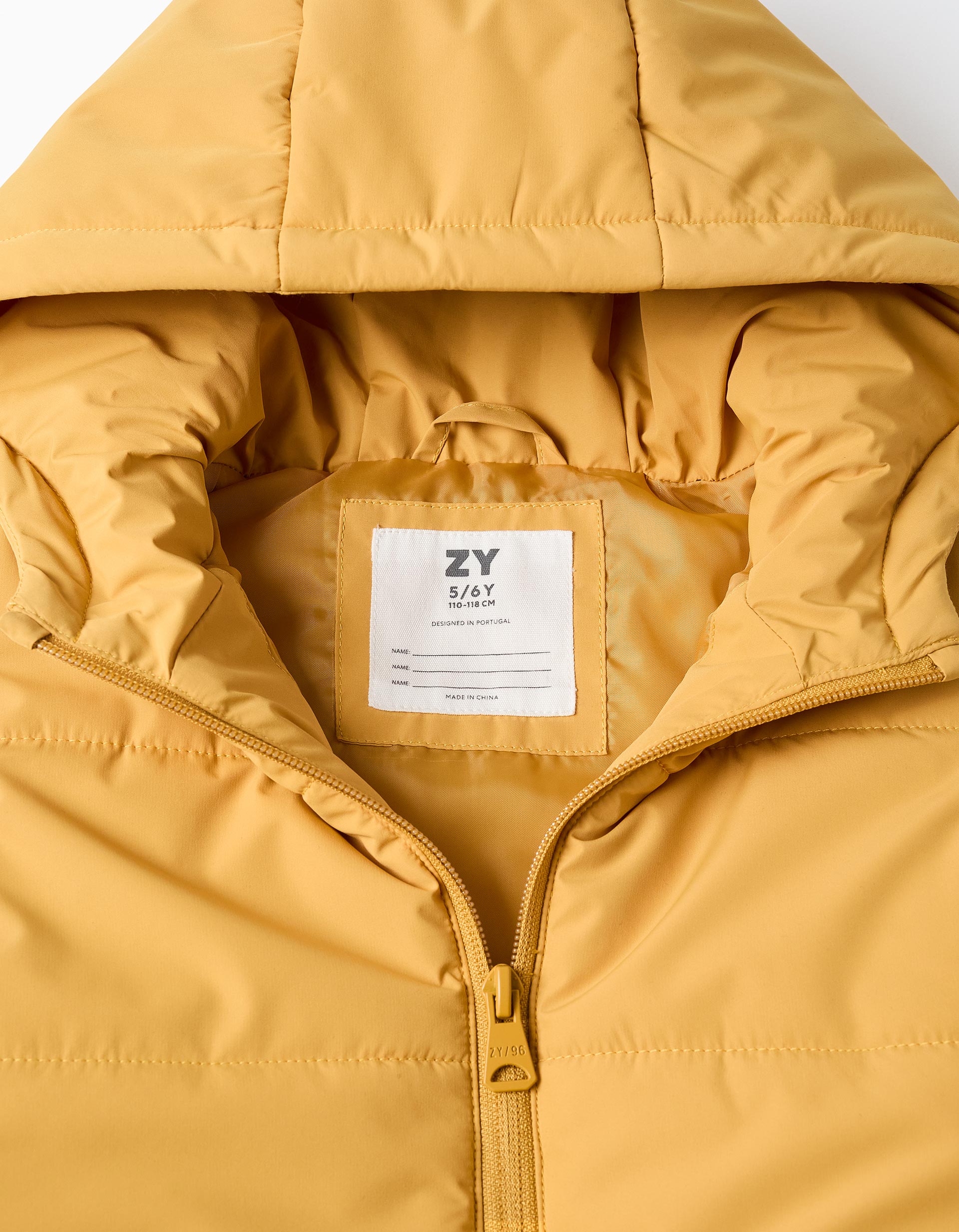 Hooded puffer vest with front zip for children, mustard yellow