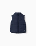 Padded vest with fleece lining and side pockets for babies, navy blue