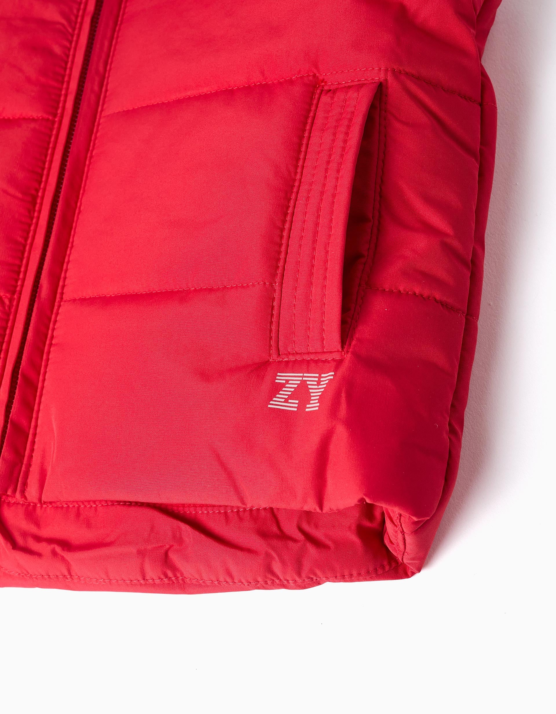 Padded vest with fleece lining and side pockets for babies, red