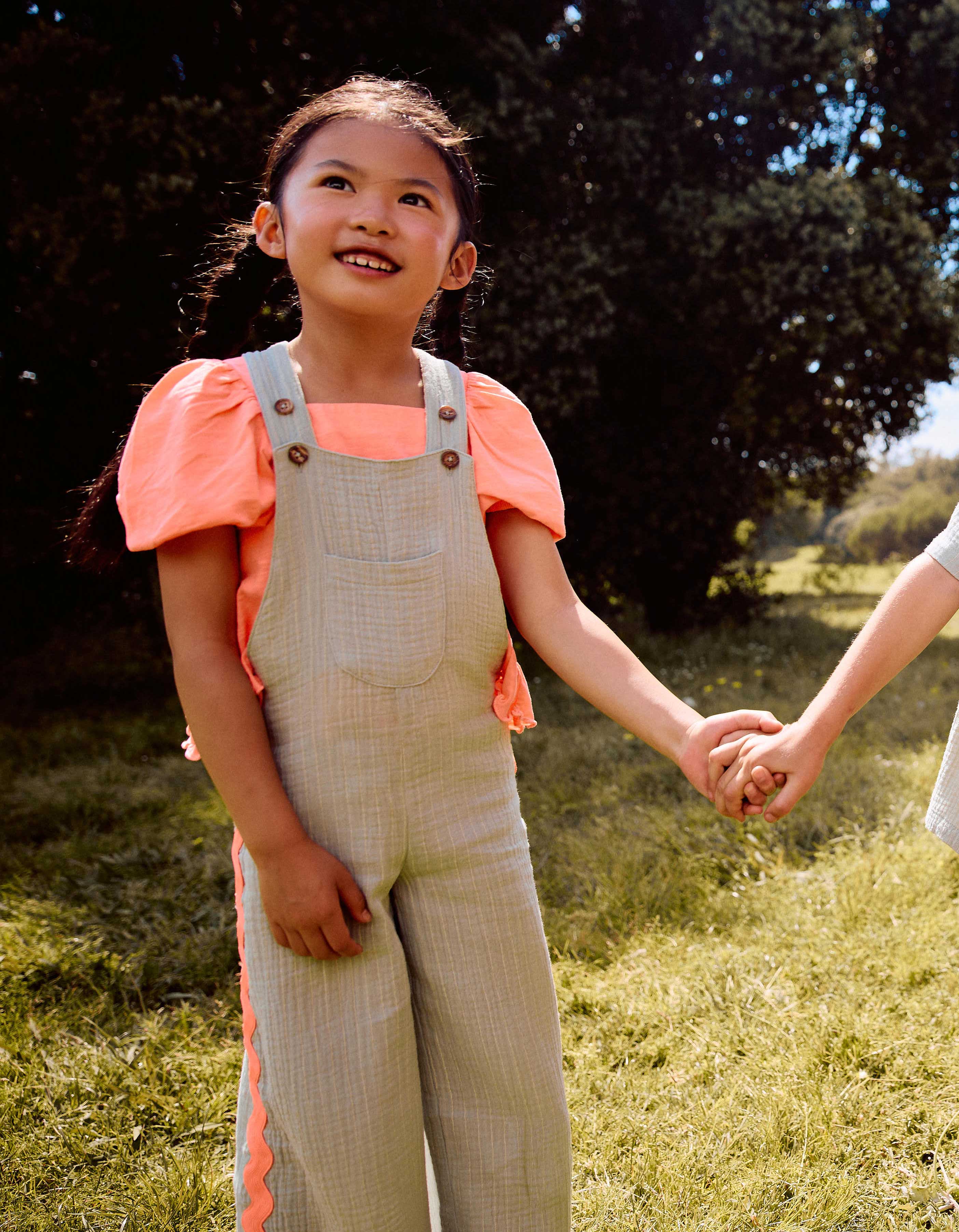 Cotton dungarees with ric rac tape for girls, green/neon coral